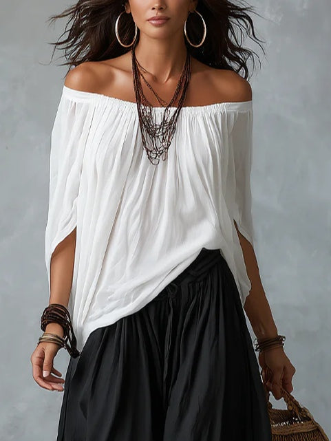 Ensemble haut blanc à épaules dénudées et pantalon évasé style lanterne