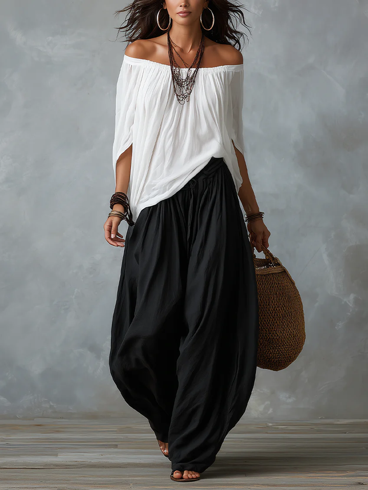 Ensemble haut blanc à épaules dénudées et pantalon évasé style lanterne