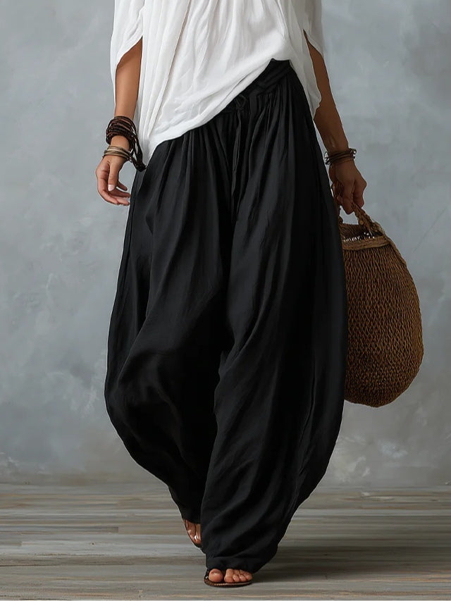 Ensemble haut blanc à épaules dénudées et pantalon évasé style lanterne