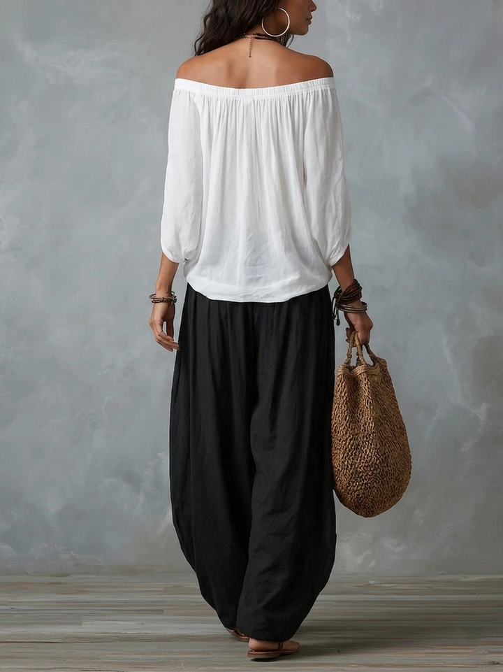 Ensemble haut blanc à épaules dénudées et pantalon évasé style lanterne