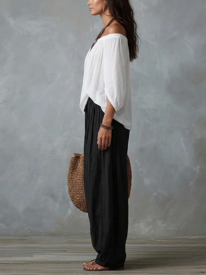 Ensemble haut blanc à épaules dénudées et pantalon évasé style lanterne